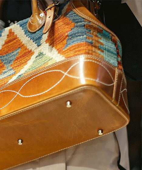 Handcrafted Wool Rug & Leather Travel Bag