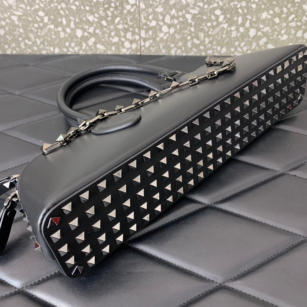 Studded Elegance Barrel Bag