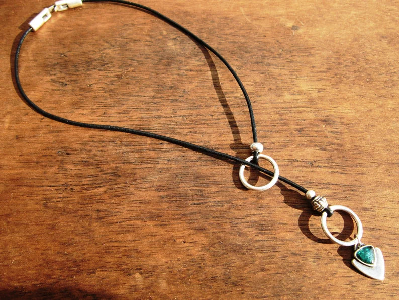 boho-chic leather and silver necklace.